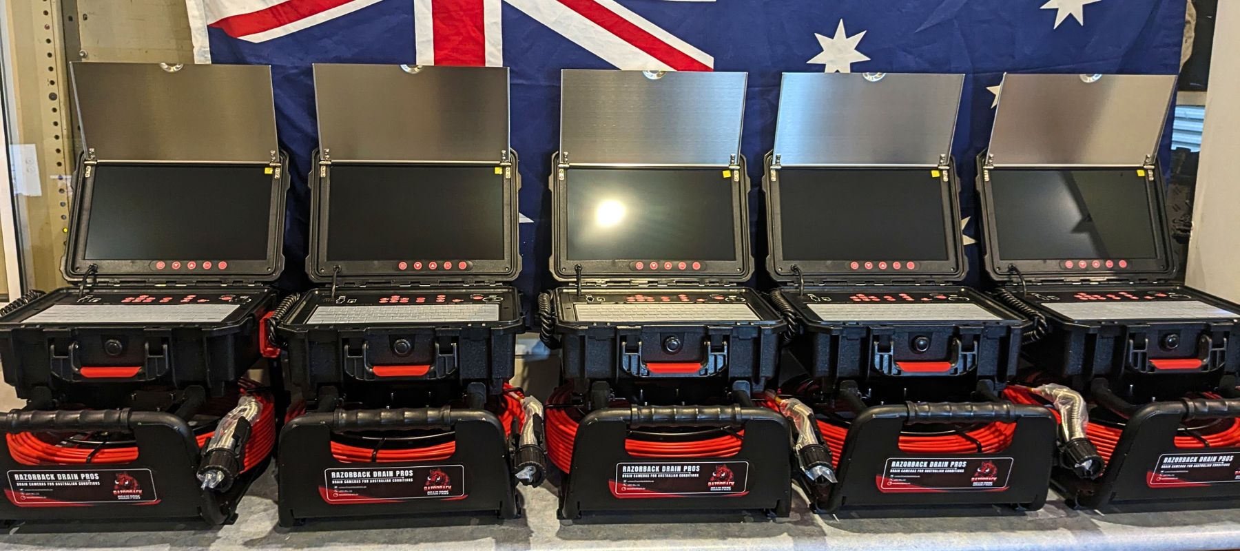 The Razorback Drain Cameras are lined up on the table.