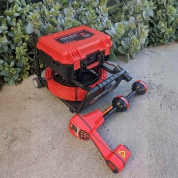 The Boar Drain Camera with Ridgid Locator Lay on the Floor